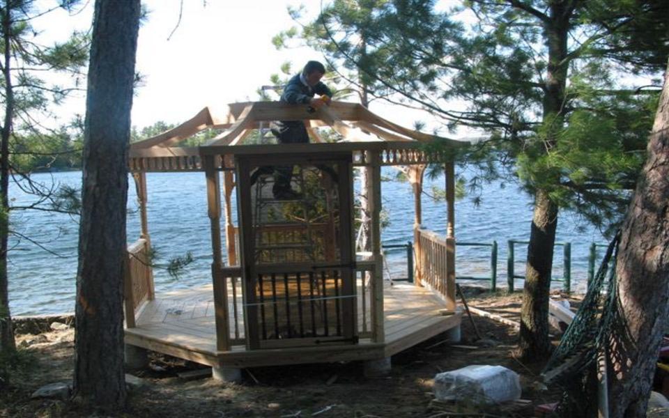 outdoor wooden octagon deck gazebo build in Muskoka