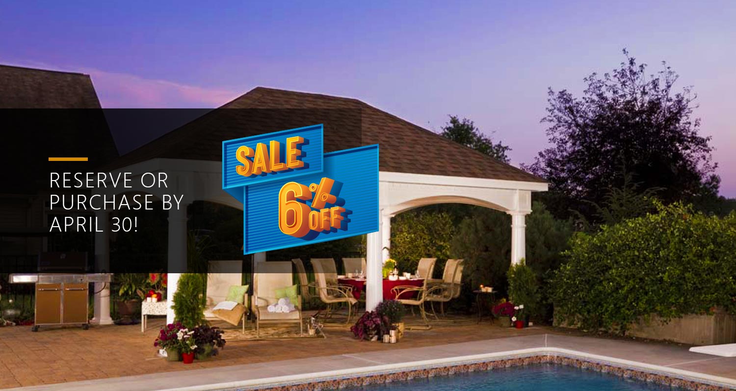 wooden pavilion in landscaped backyard