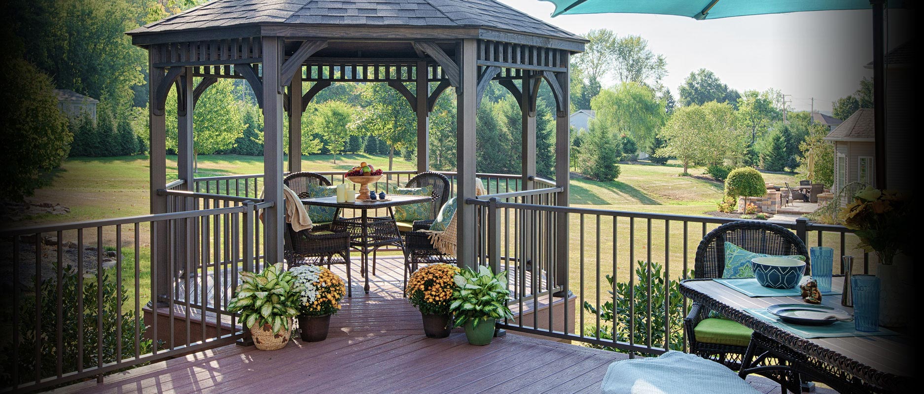 wooden octagon gazebo built as an addition to pre-existing deck